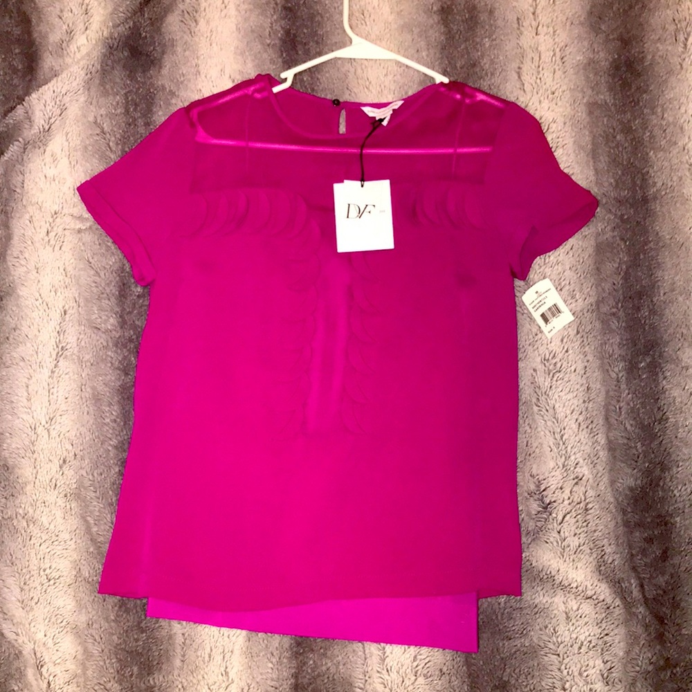 Classy and yet summery top that is a beautiful shade of pink/fuchsia.